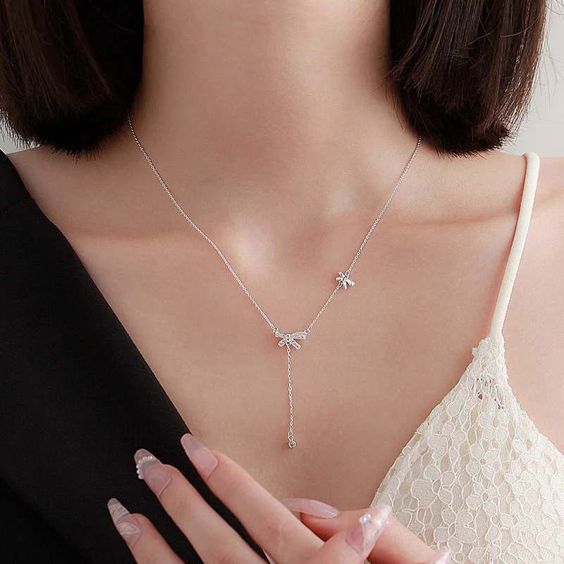 Niche S999 sterling silver bow necklace womens light tassel clavicle chain gift 241220