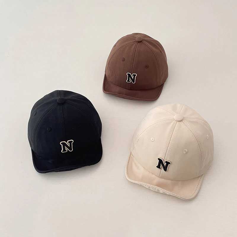 Caps Hats Korean baby summer hat with letter N embroidery adjustable baseball cap suitable for young boys and girls toe soft hat childrens sun hat H24