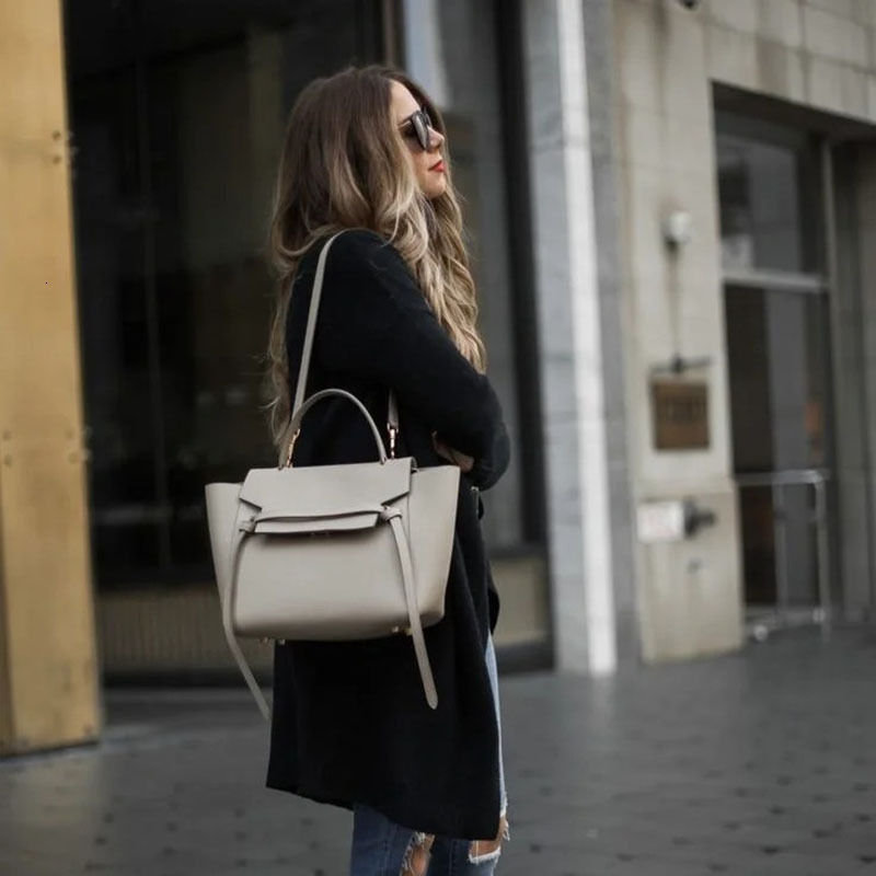 The High-Quality Designer Catfish Bag Can Be Carried By Hand Crossbody With Leather Shoulder Strap To Adjust The Length