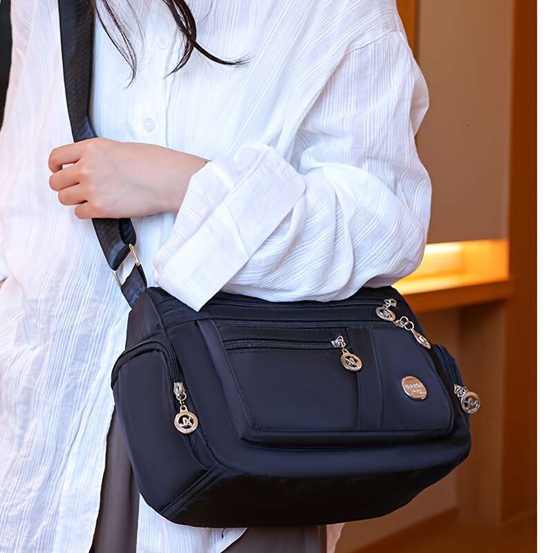 Nylon Casual Waist Pack Tassel Detail, Lightweight Travel Shoulder Bag, Adjustable Strap, Zipper Closure, Polyester ed, Multi-Pocket Design, with No W