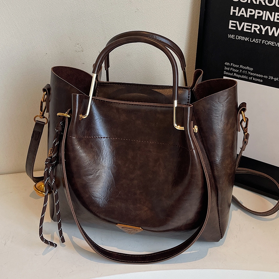 2025 free shipping designer bags high-capacity Comfortable Handheld balck coffee for Ladies' daily versatility