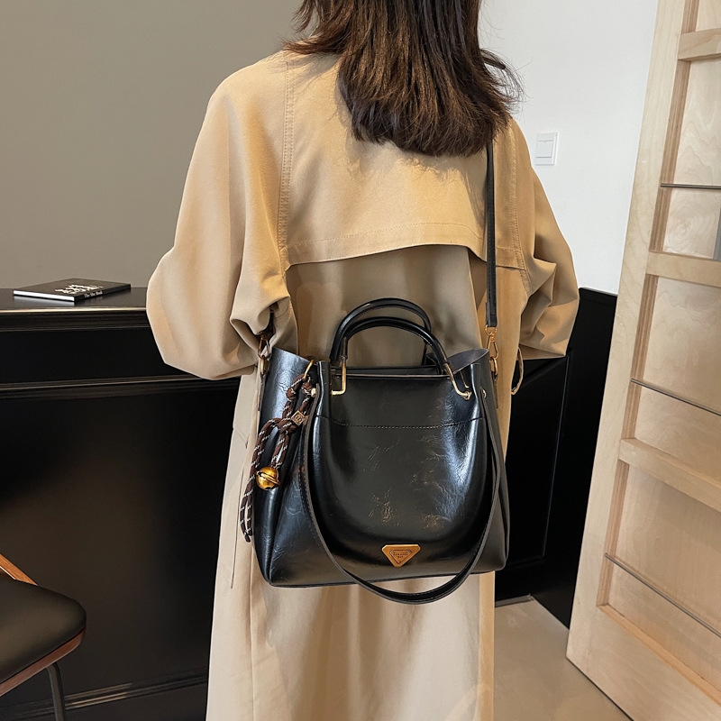 2025 free shipping designer bags high-capacity Comfortable Handheld balck coffee for Ladies' daily versatility