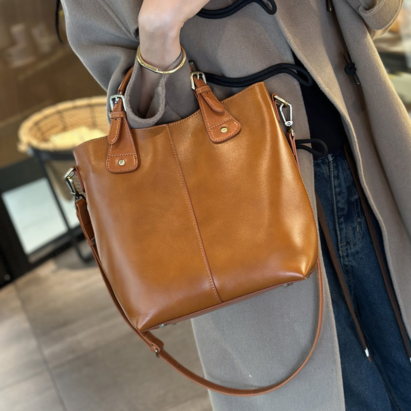 Genuine Leather Retro Fashion Crossbody Soft Commuter Handbag Bucket Bag For Women Shopping Cartoon BagVoyage