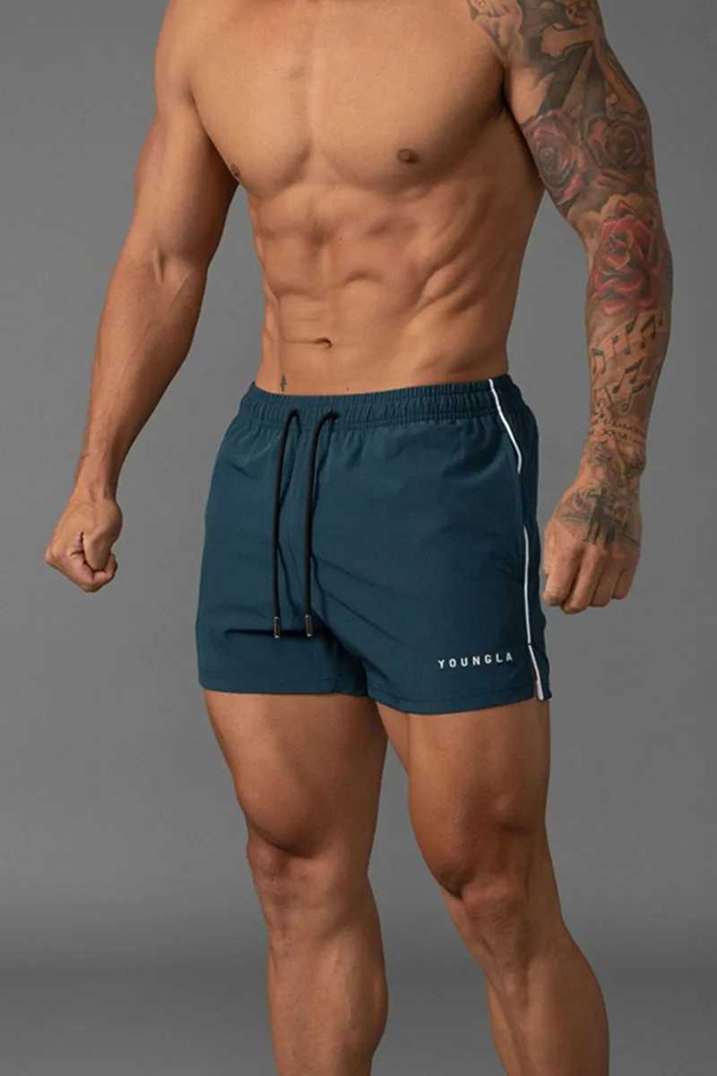 Summer mens short style new gym fitness casual loose shorts outdoor fitness beach quick drying shorts mens brand sports pants W241223