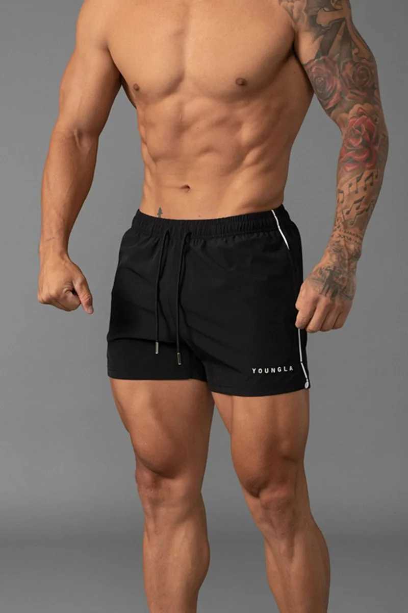 Summer mens short style new gym fitness casual loose shorts outdoor fitness beach quick drying shorts mens brand sports pants W241223