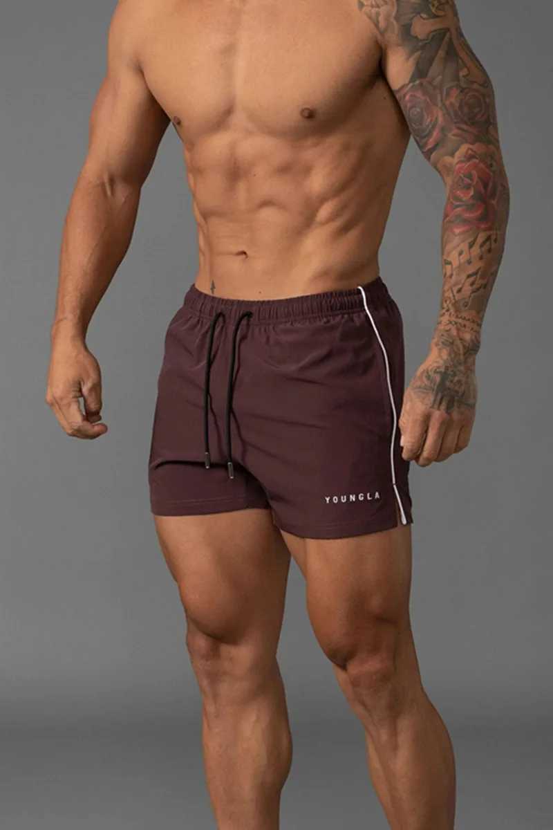 Summer mens short style new gym fitness casual loose shorts outdoor fitness beach quick drying shorts mens brand sports pants W241223