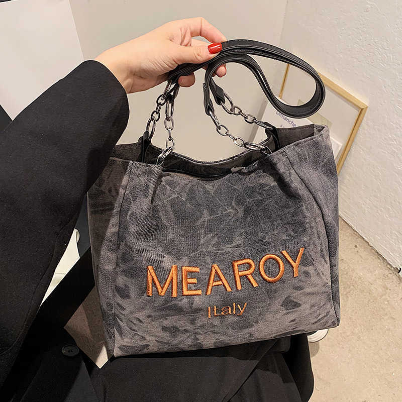 Small niche design denim bag, women's new versatile large capacity handbag, single shoulder tote bag class commuting 241215