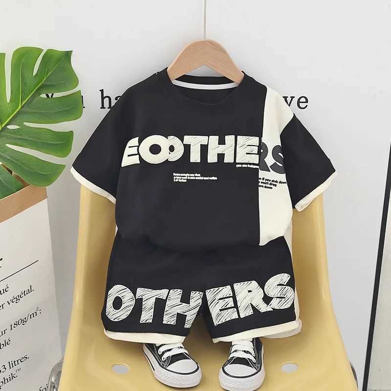 Clothing Sets 2024 Designer Baby Boy 18 Months Old Summer Childrens Clothing Patch Work Letter Short Sleeve T-shirt and Short Sleeve Boys Clothing Set