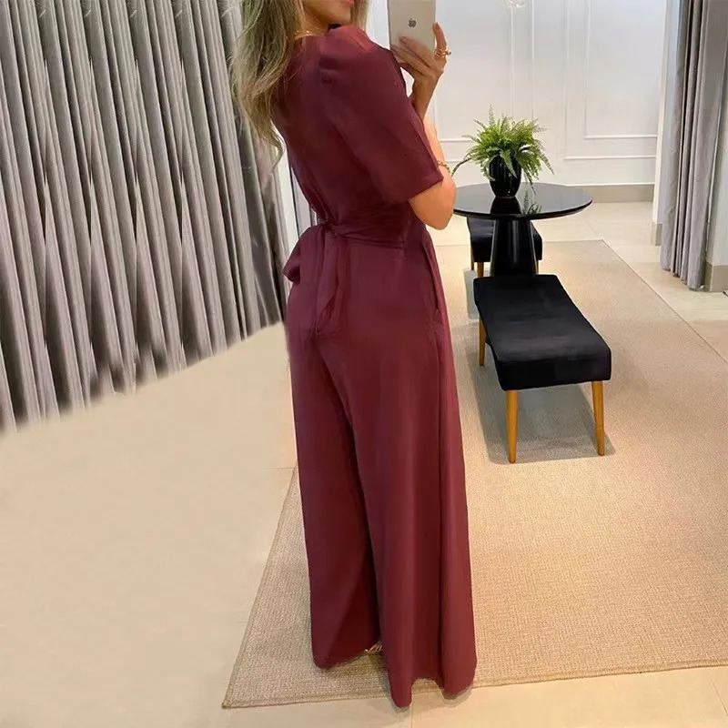 Spring and Summer Fashion Elegant Solid Color V-neck Slim Waist Womens Wide Leg jumpsuit Fashion Mid sleeved Long Pants 241224