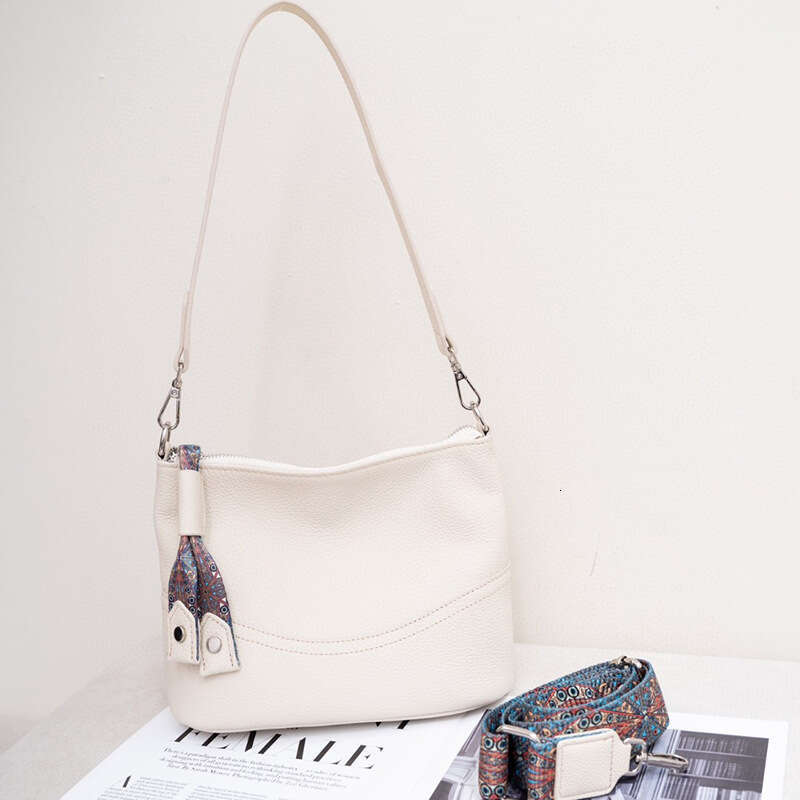 Genuine leather women's 2024 new top layer cowhide shoulder handbag Korean high-end feeling versatile crossbody bucket bag