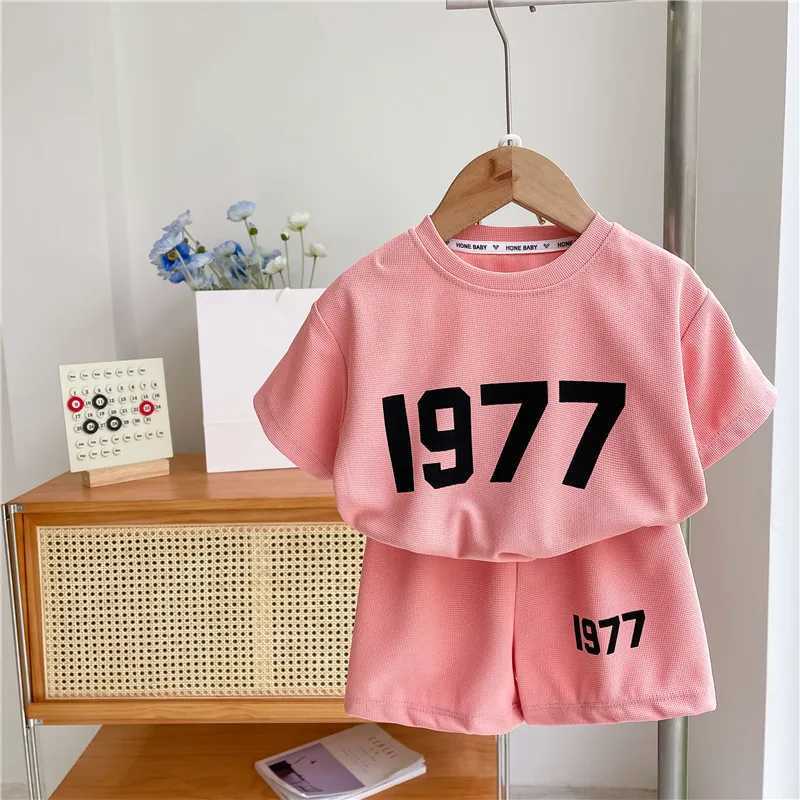 Clothing Sets Trendy Solid Color Two Piece Sets Summer Clothing Girls And Boys Casual Loose Short Sleeve Tshirt+Shorts Fashion Sports 2pcsY241225PAI2