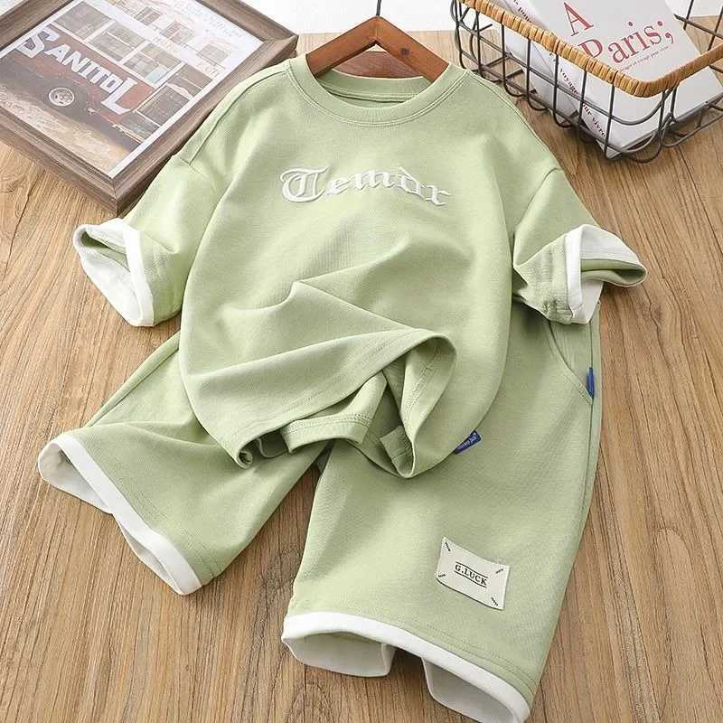 Clothing Sets Childrens Boy Clothes Set Summer Patchwork Letter Tshirts and Shorts Suit Teenage Short Sleeve Top Bottom 2pc Fashion TracksuitY241225YY