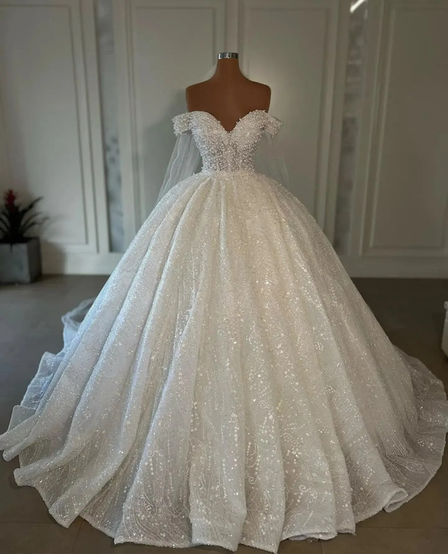 2025 Arabic Dubai Ball Princess Pearls Dresses Sheer Off The Shoulder Neck Bridal Gowns Puffy Wedding Gown