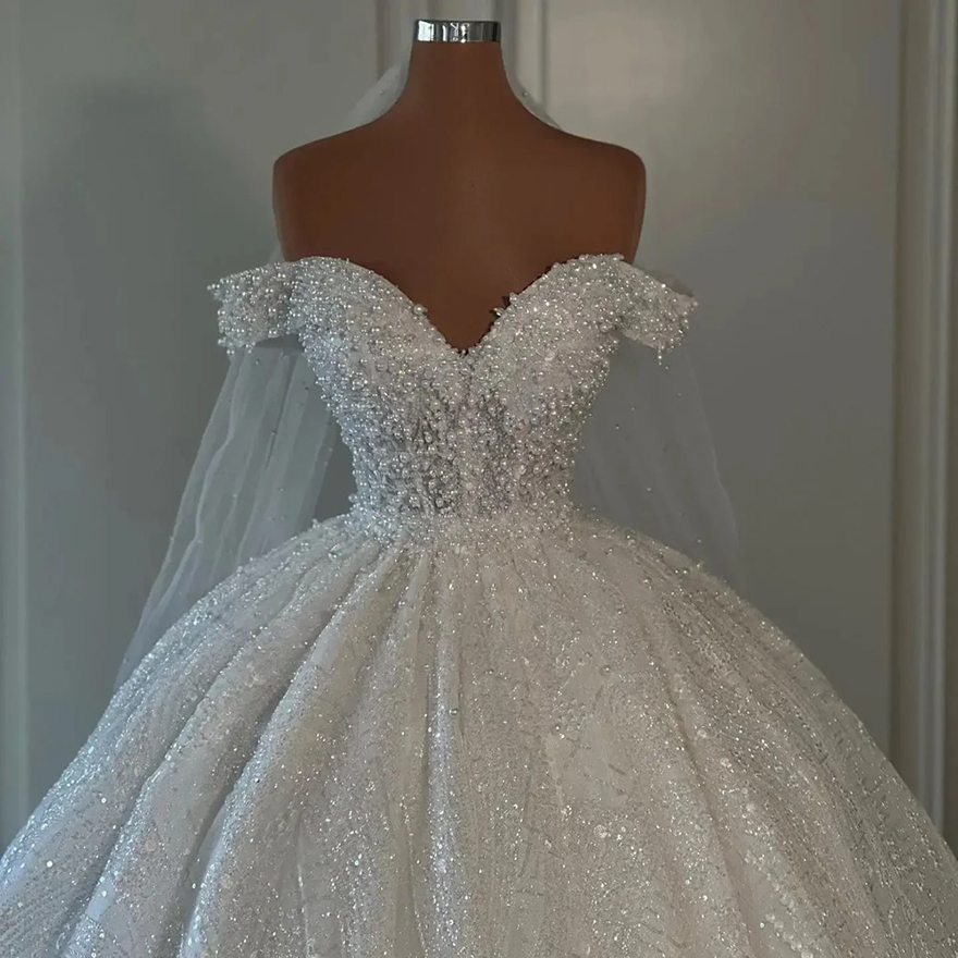 2025 Arabic Dubai Ball Princess Pearls Dresses Sheer Off The Shoulder Neck Bridal Gowns Puffy Wedding Gown