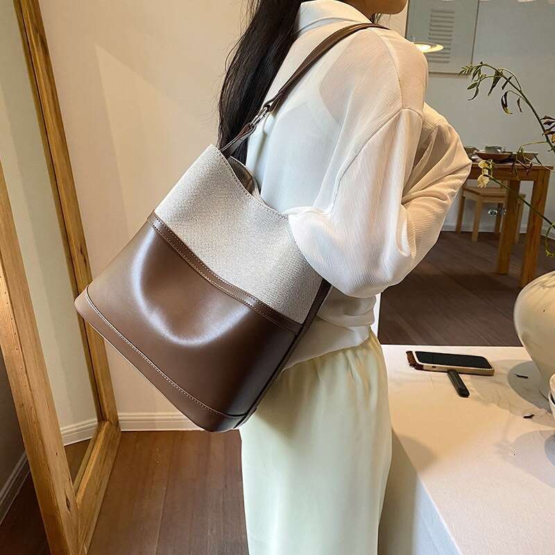 2024 New Simple Ruiying Water Bucket Versatile Instagram Fashion Handheld Crossbody Korean Edition Women's Bag