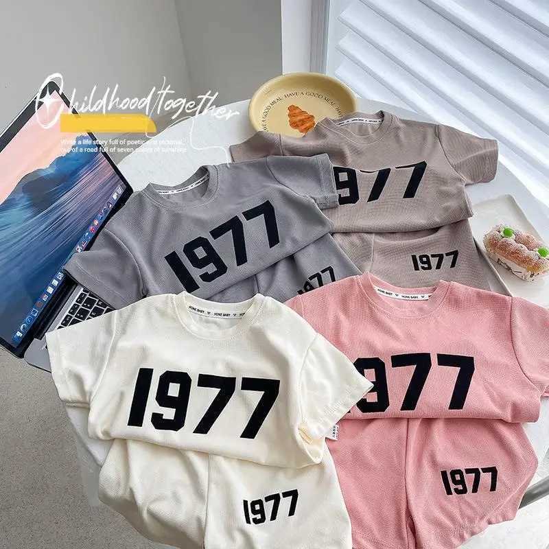 Clothing Sets Trendy Solid Color Two Piece Sets Summer Clothing Girls And Boys Casual Loose Short Sleeve Tshirt+Shorts Fashion Sports 2pcsY241225PAI2