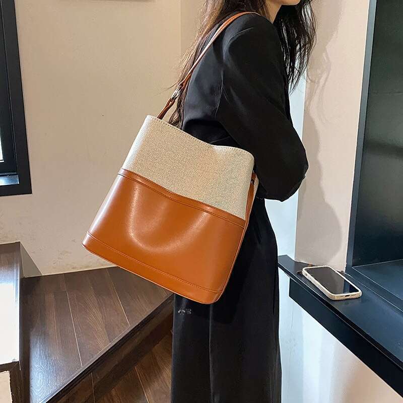 2024 New Simple Ruiying Water Bucket Versatile Instagram Fashion Handheld Crossbody Korean Edition Women's Bag