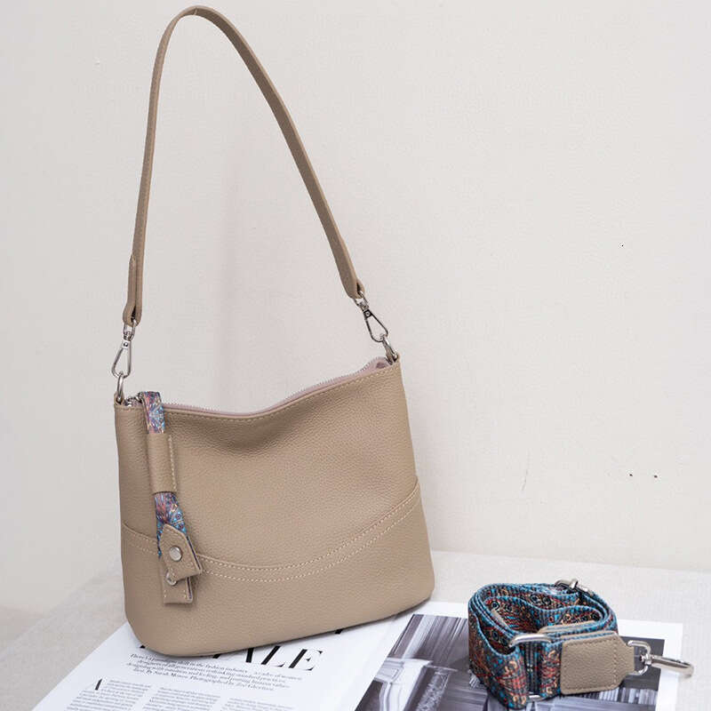 Genuine leather women's 2024 new top layer cowhide shoulder handbag Korean high-end feeling versatile crossbody bucket bag