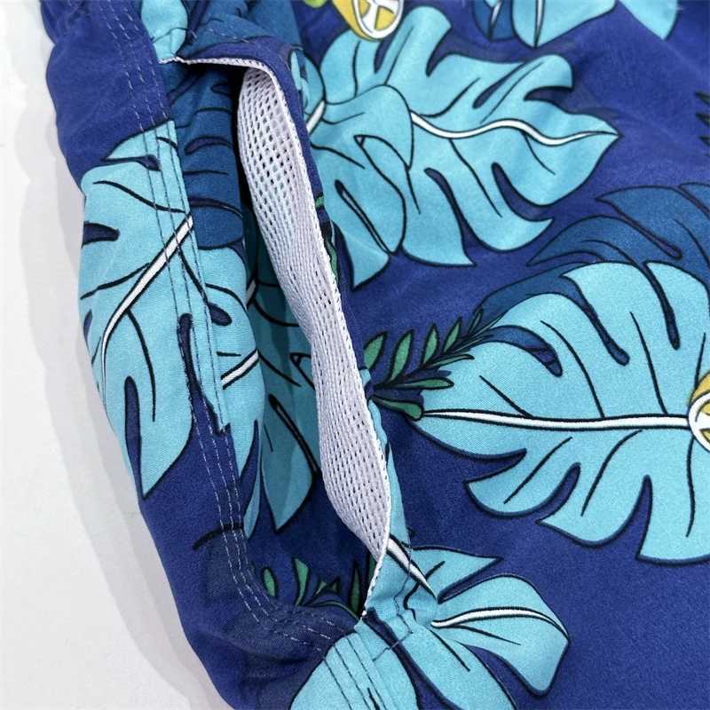 Fashionable mens beach shorts mens running shorts beach swimming shorts with breathable mesh lining W241226