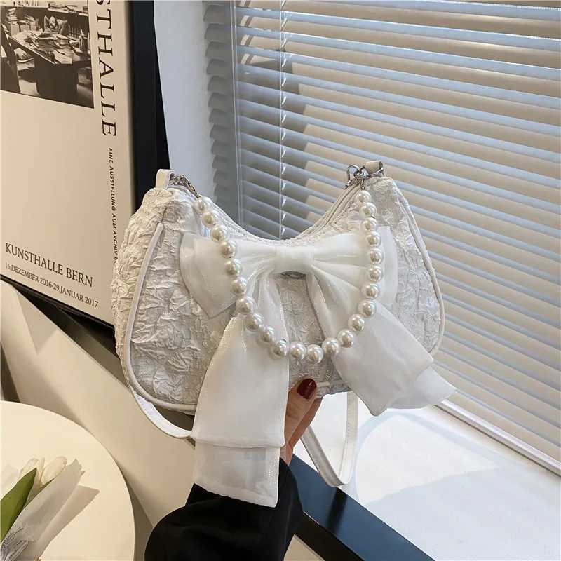 Pearl Female Bag Luxury Designer Handbag Bow Crossbody Bags Fi Canvas Womens 2023 Trend Shoulder Bag Purses XJ250718