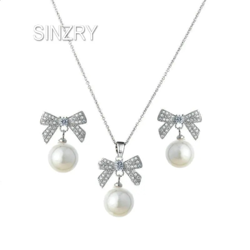 SINZRY Korean jewelry white color cubic zircon bowknot simulated pearl pendant necklace earring jewelry set christmas gift 241226