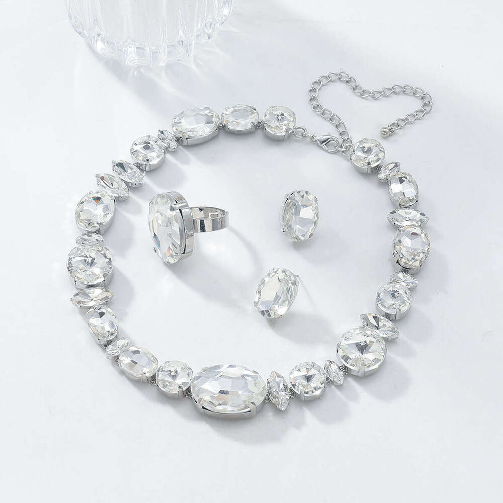 Autumn and Winter New Women's Fashion Colored Water Dia Inlaid Neck Chain Necklace Earnail Ring Jewelry Set
