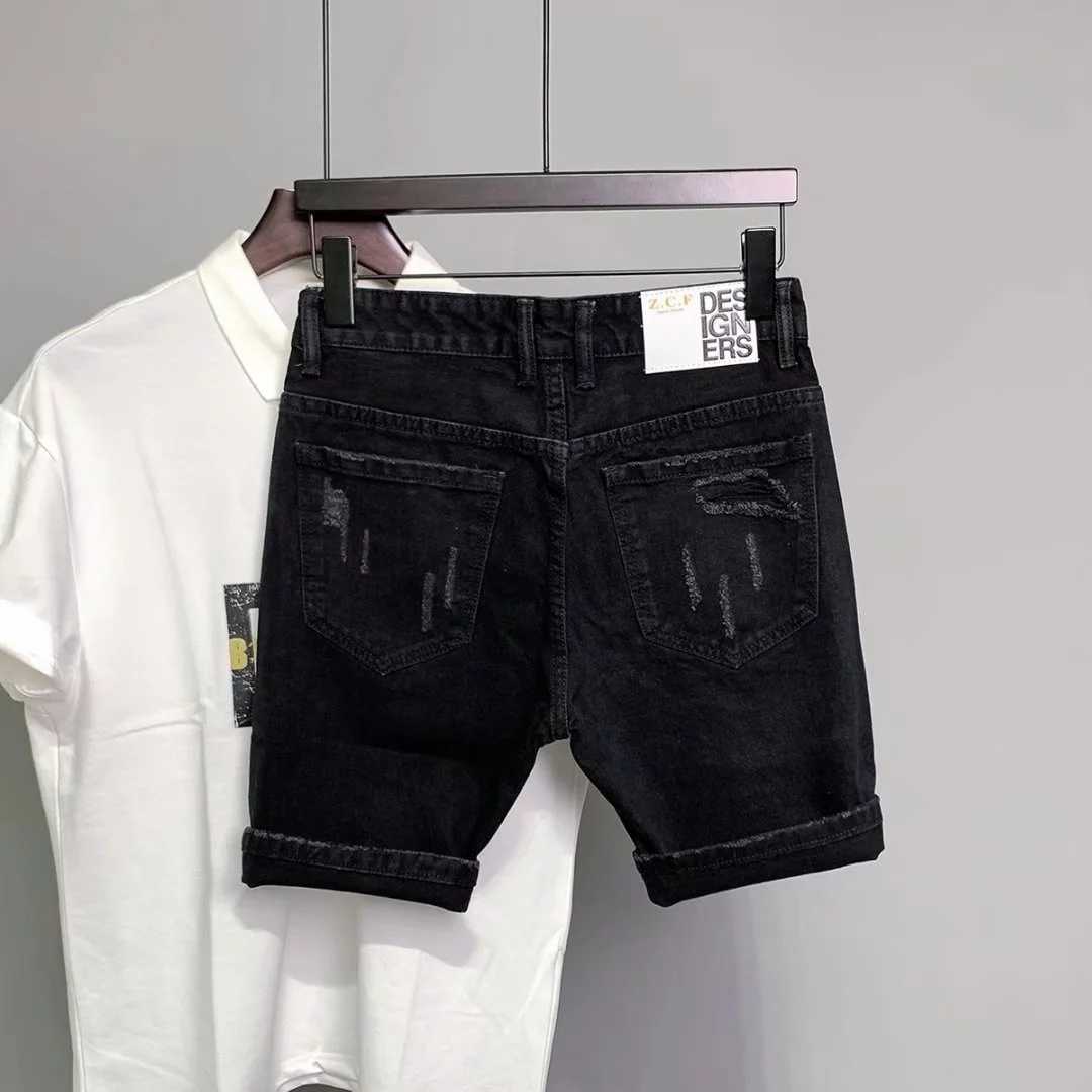 Summer mens black hole sticker ultra-thin denim shorts Korean fashion hip-hop leg Harajuku fashion mens black jeans shorts W241226