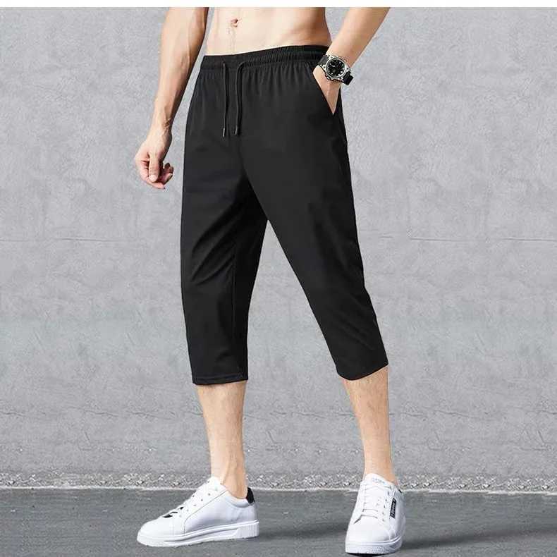 2024 Summer Mens Shorts Breathable Stretched Nylon Ice Silk 3/4 Short Capris Pants Sports Breeches Plus Size Casual Shorts MaleXJ241226