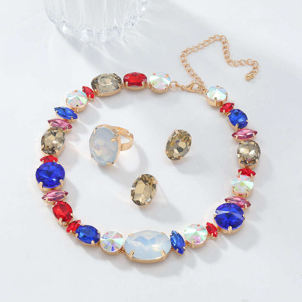 Autumn and Winter New Women's Fashion Colored Water Dia Inlaid Neck Chain Necklace Earnail Ring Jewelry Set