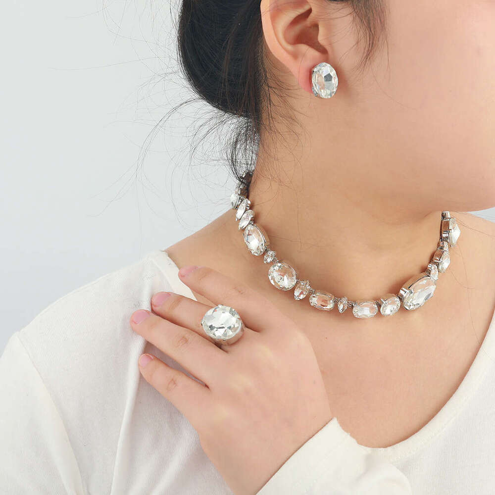 Autumn and Winter New Women's Fashion Colored Water Dia Inlaid Neck Chain Necklace Earnail Ring Jewelry Set
