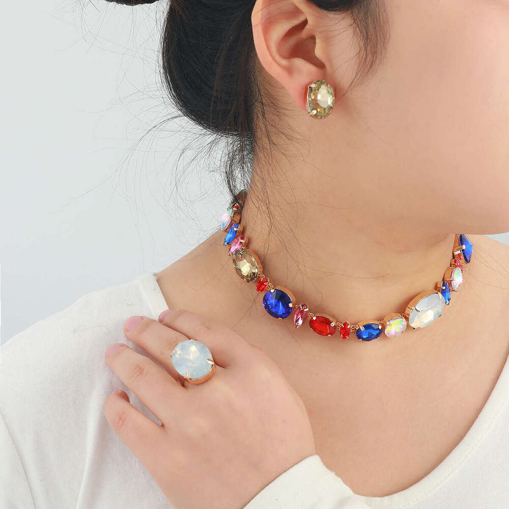 Autumn and Winter New Women's Fashion Colored Water Dia Inlaid Neck Chain Necklace Earnail Ring Jewelry Set