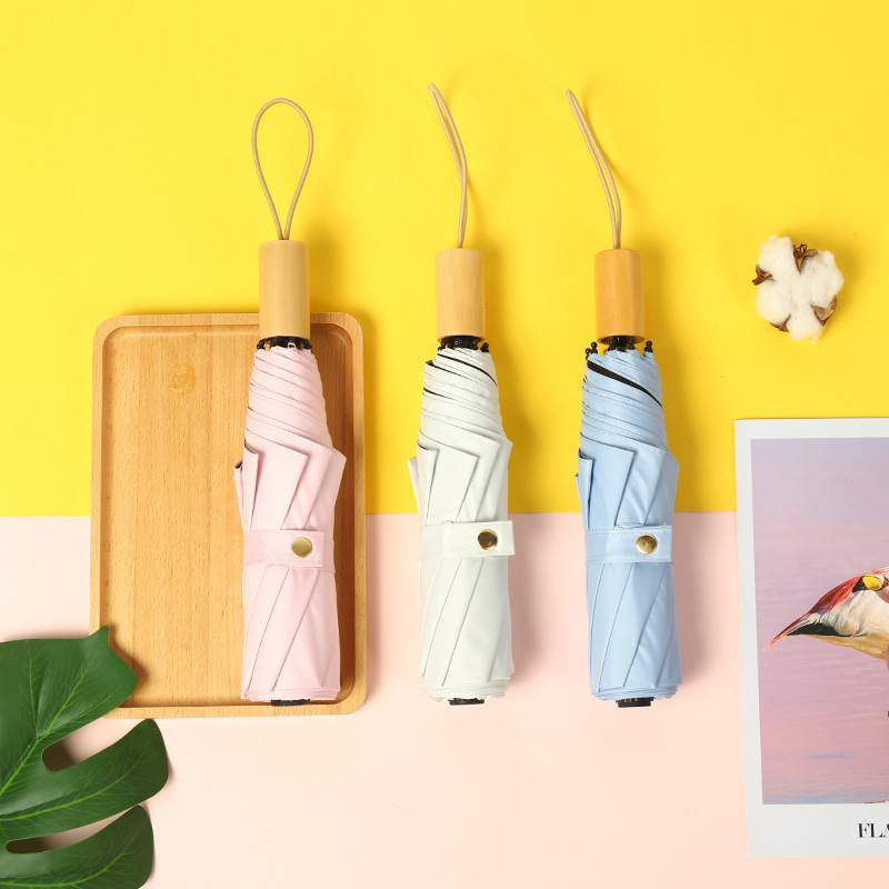 Adorable Triple-Fold Real Wood Handled Umbrella - Protective Against UV Rays with Customizable Advertiser's Mark