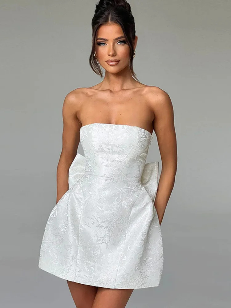 Mozision Backless Bow Sexy Mini Dress For Women Fashion Off-shoulder Strapless Sleeveless Bodycon Club Party Dress Elegant 241223