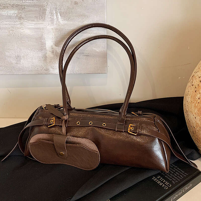 Autumn and winter British niche oil wax leather touch hand-held bag, fashionable commuting armpit single shoulder women's bag