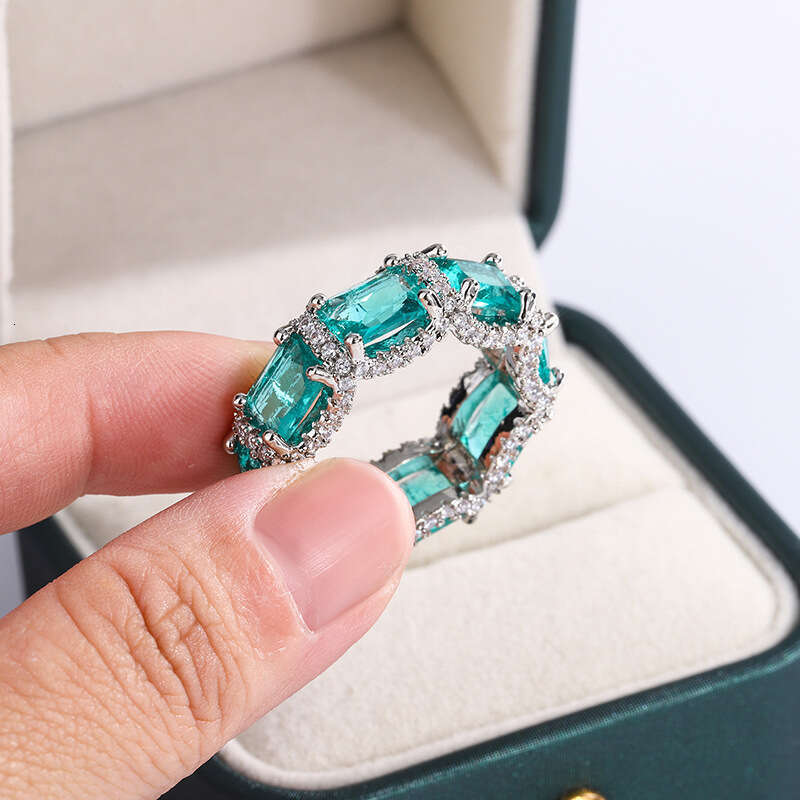 Paraiba simulation women's recommended high-end jewelry inlaid with sea blue gemstone topaz ring