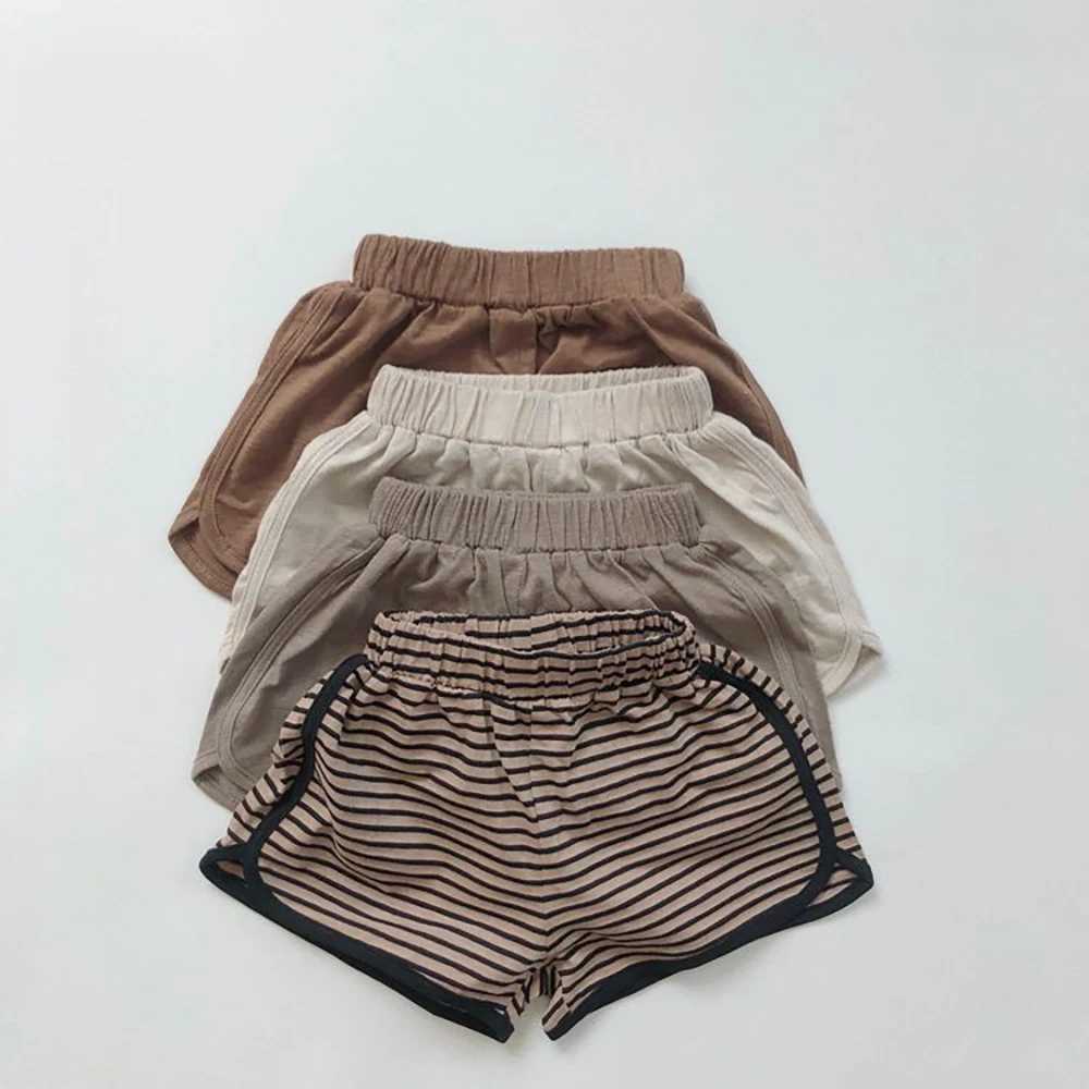 2024 Preschool Boys and Girls Shorts Solid Color Stripe Elastic Childrens Shorts Casual Korean Style Youth and Childrens Legs W241227