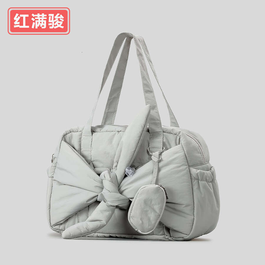 Autumn winter new niche design butterfly knot cotton filled handbag, fashionable and versatile square bag, women's lightweight armpit bag