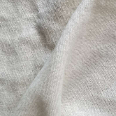 Lightweight natural sweat resistant cotton en plain color single-sided knitted T-shirt cardigan fashion fabric
