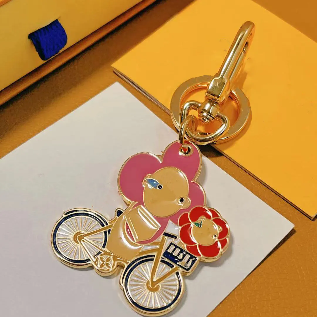 2024 Handmade designer keychains dragonne multicolor key chain women men brown leather bag wallet lanyard plated gold accessories dragonne keychain letter 755535