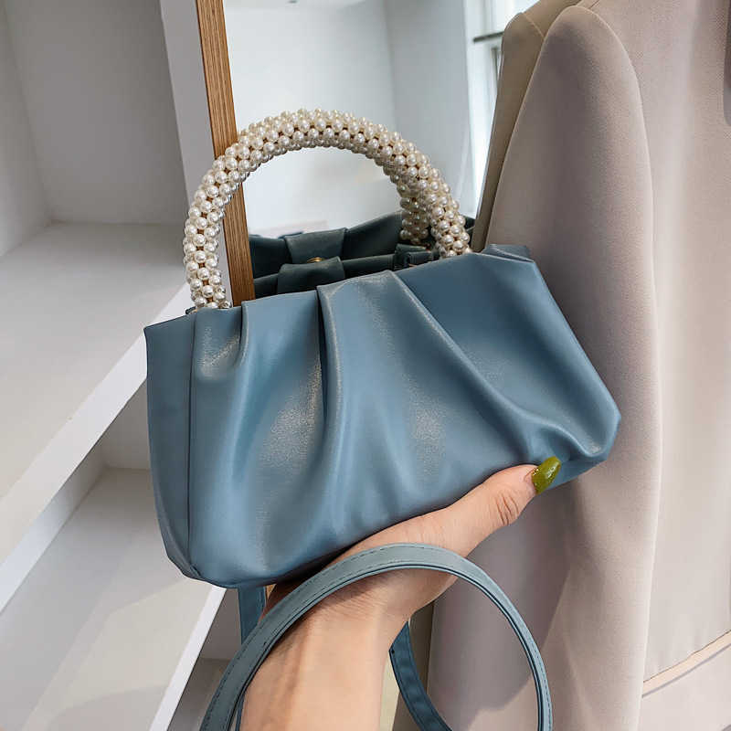 Solid women's bag 2022 summer new cloud bag fashion soft face portable bag simple foreign style single shoulder diagonal bag