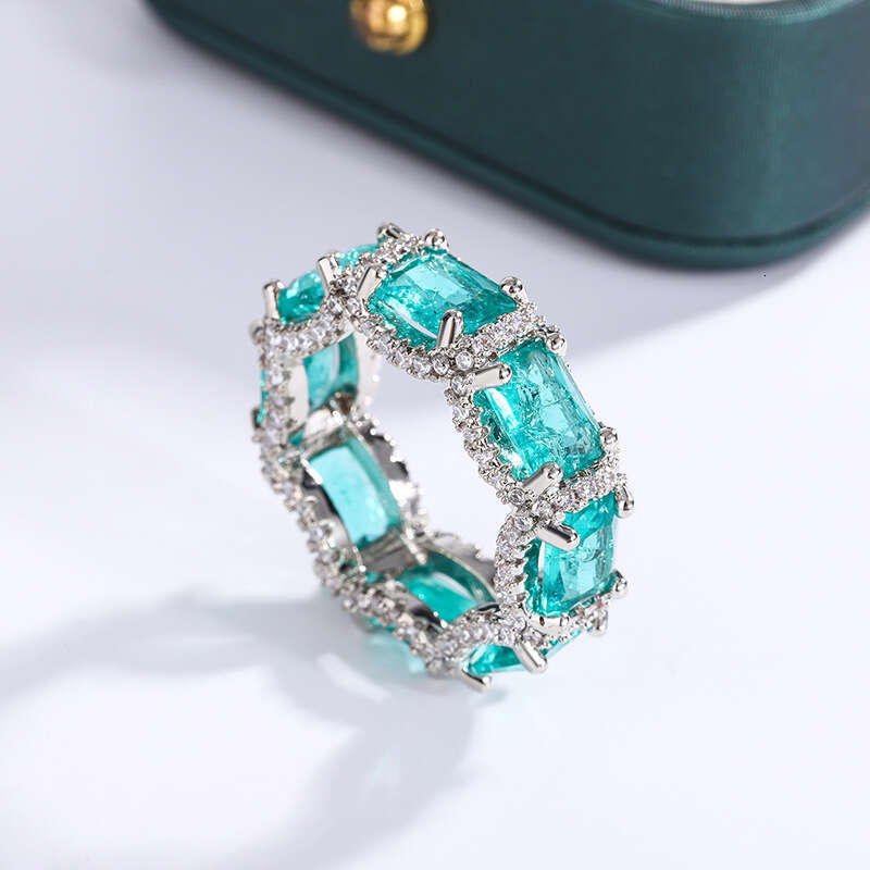 Paraiba simulation women's recommended high-end jewelry inlaid with sea blue gemstone topaz ring
