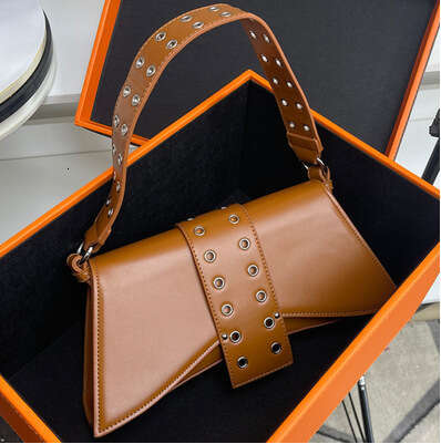 2025 New Bag Niche Dark Heavy Industry Porous Contrasting Color Patent Leather Armpit Single shoulder Crossbody Bag