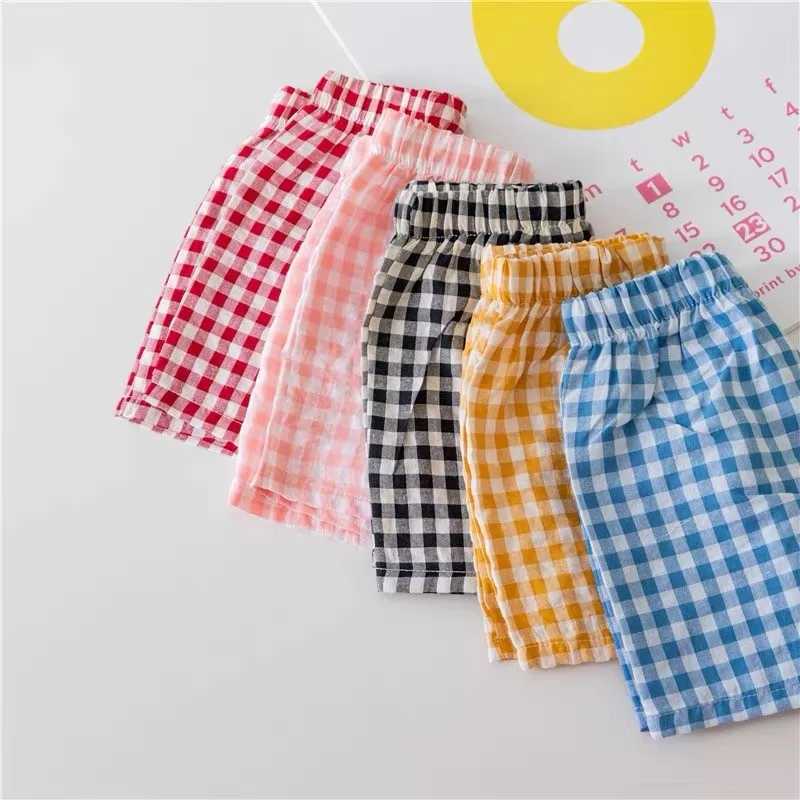 Childrens flat shorts new style casual sports pants loose thin version family pants summer boys and girls cute and fashionable beach shorts W241227