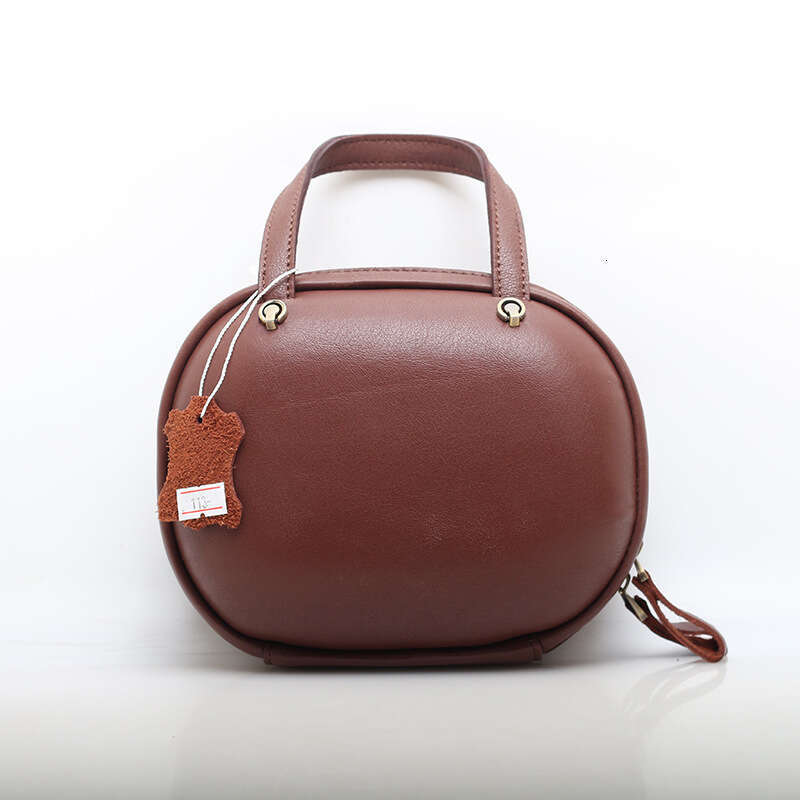 Leather Women's with Niche Temperament Portable Lunch Box Summer Minimalist Top Layer Cowhide Shoulder Crossbody Bag Shaped Small bag