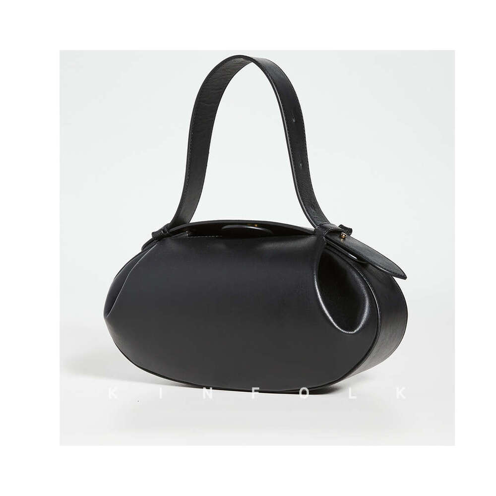 This year's popular crossbody casual versatile three-dimensional women's armpit small round French stick bag handbag