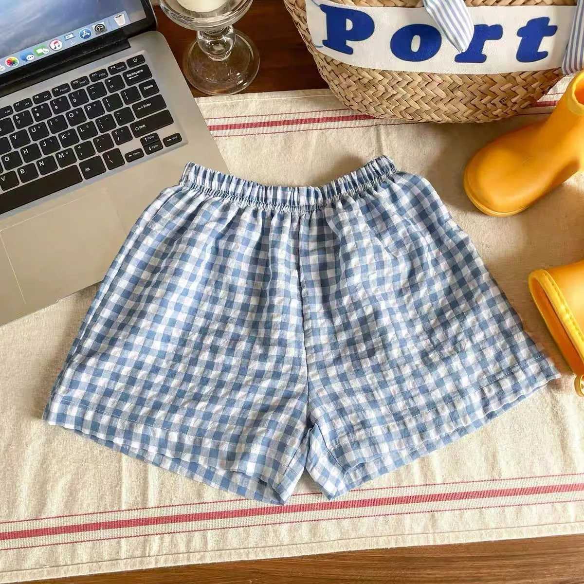 Childrens flat shorts new style casual sports pants loose thin version family pants summer boys and girls cute and fashionable beach shorts W241227