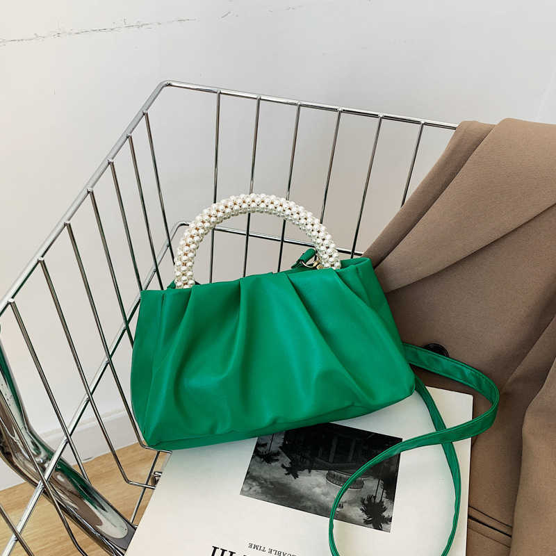 Solid women's bag 2022 summer new cloud bag fashion soft face portable bag simple foreign style single shoulder diagonal bag