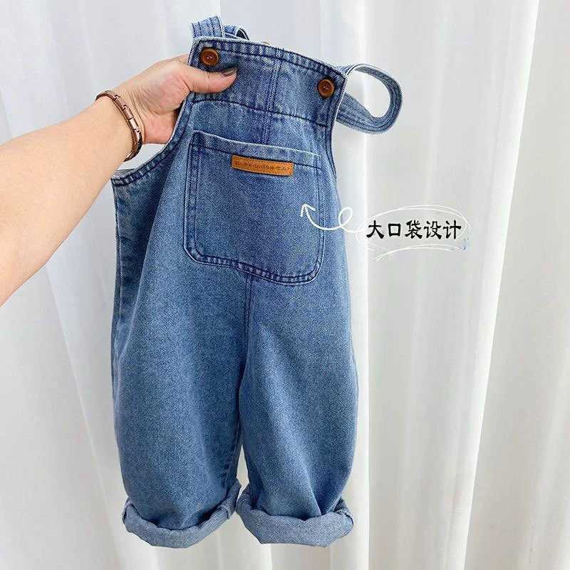 2024 Childrens Fashion Casual Backpack Trouser Boys Autumn Loose Pocket Jeans Spring New Girls Simple Solid Color Pants W241227