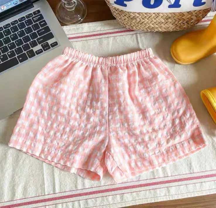 Childrens flat shorts new style casual sports pants loose thin version family pants summer boys and girls cute and fashionable beach shorts W241227