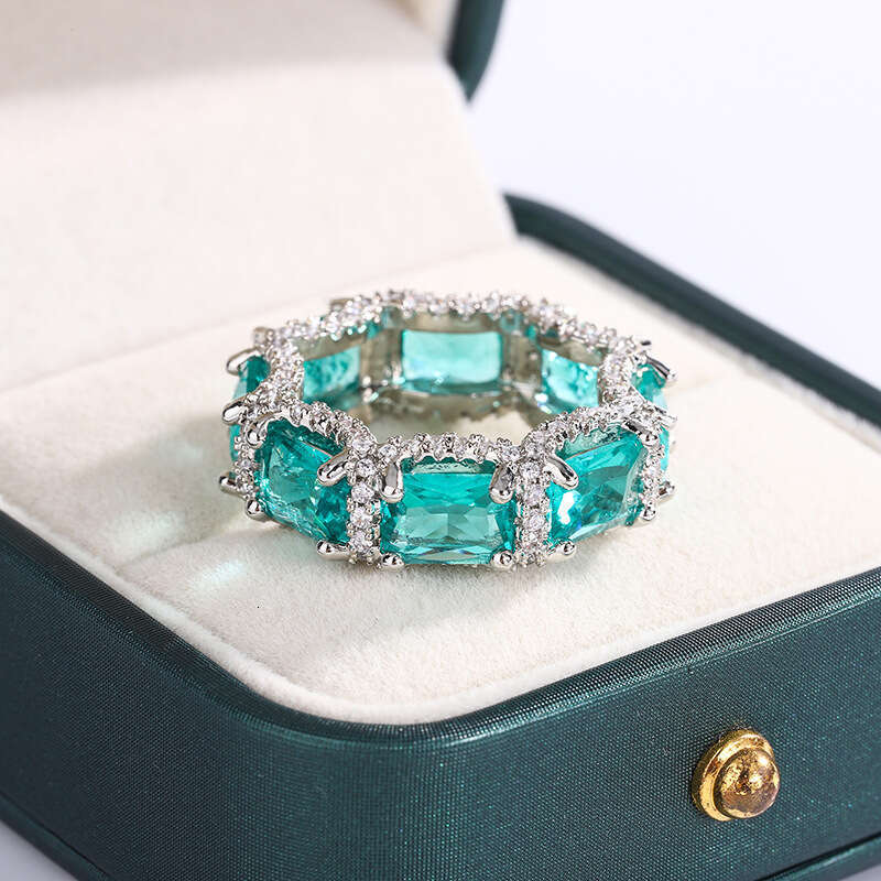 Paraiba simulation women's recommended high-end jewelry inlaid with sea blue gemstone topaz ring